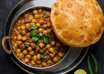 delicious-indian-chickpea-curry-with-puri-garnishes-scaled-rcd5ygwfbwxy71ib883kzzyv9borc8zmihnnwe8ll0 (1)