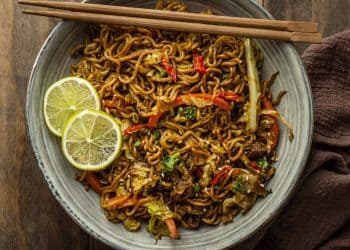 top-view-tasty-composition-noodles-table-scaled-rcdu3tuobn147ipqs0dn4maiaqq2icacpf6mxh8apw (1)